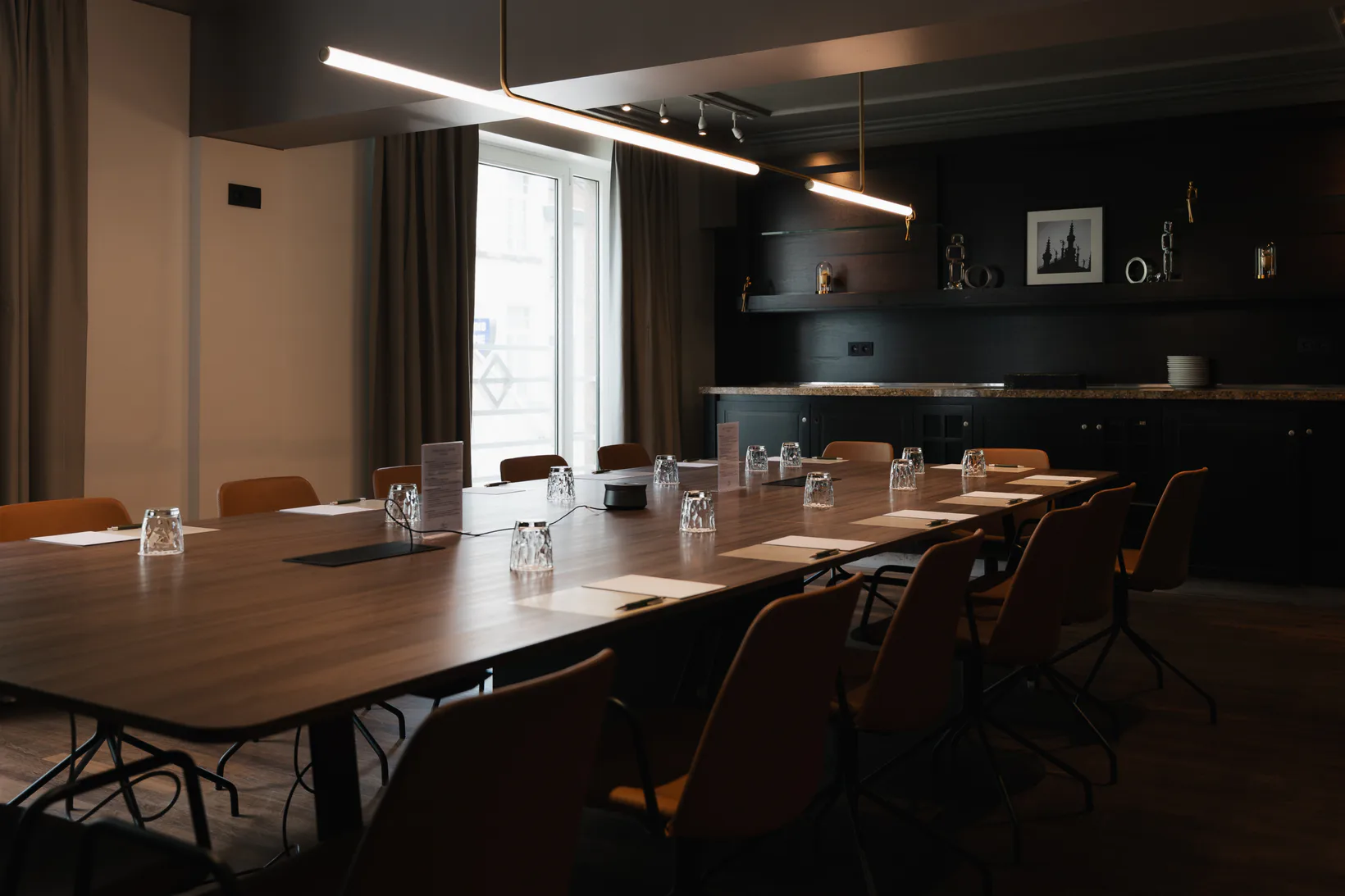 BB Design project with linear lighting above a long meeting table
